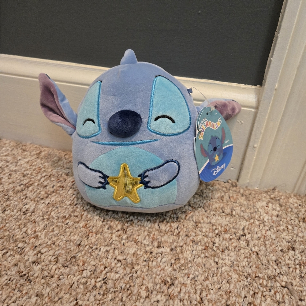 Squishmallow Disney Stitch holding Star